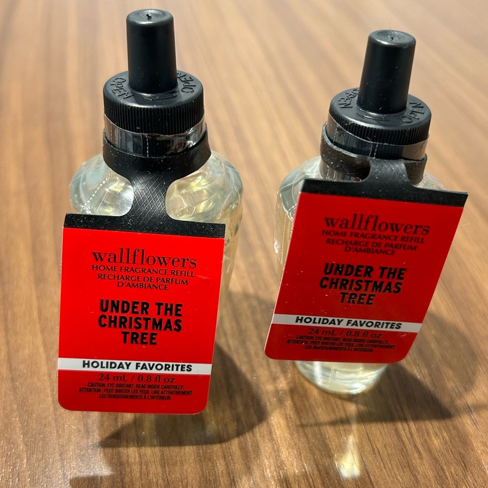 2 Bath & Body works under The Christmas Tree Wallflowers